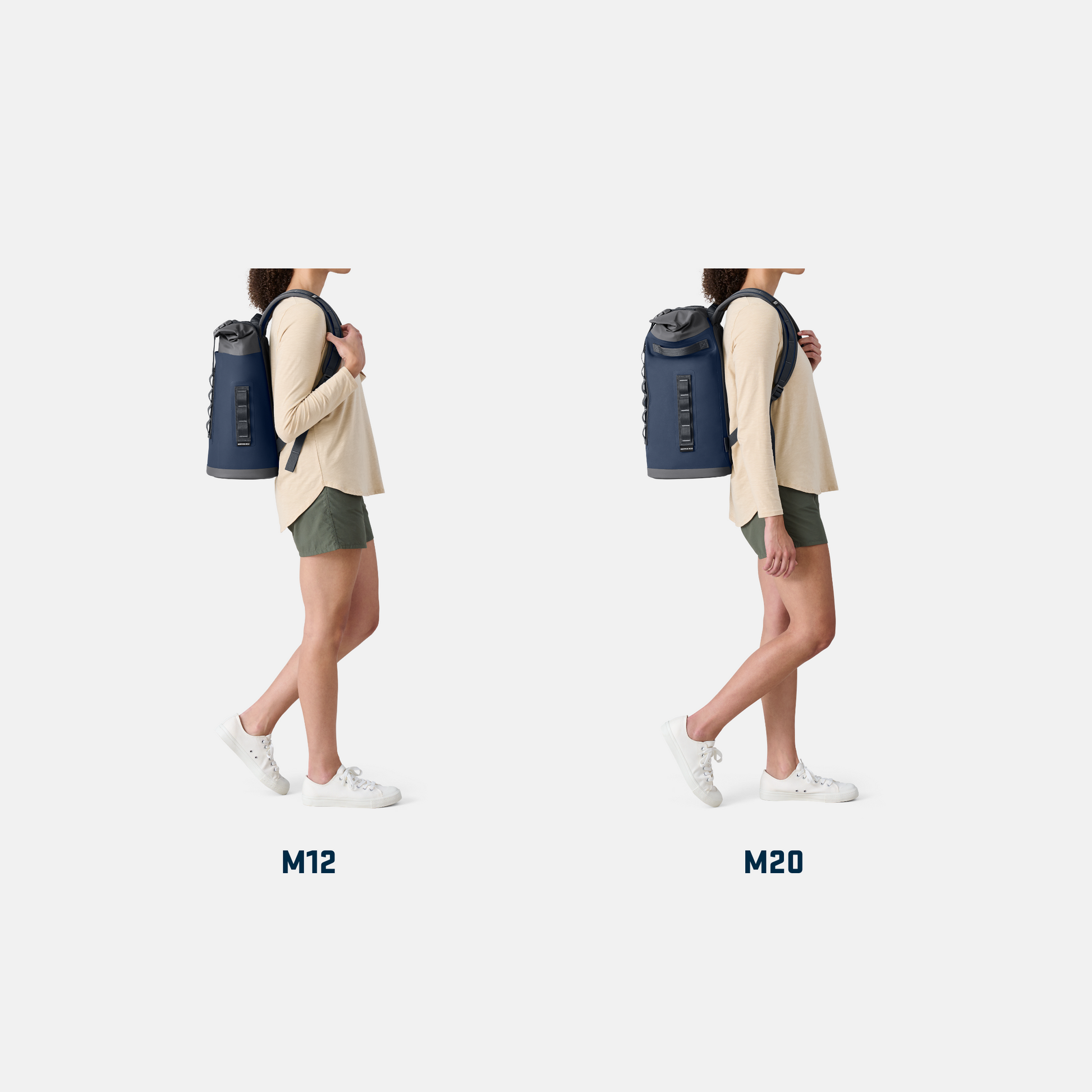Two people wearing backpacks labeled M12 and M20 on a white background