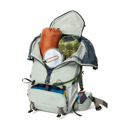 Open backpack with various items on a white background