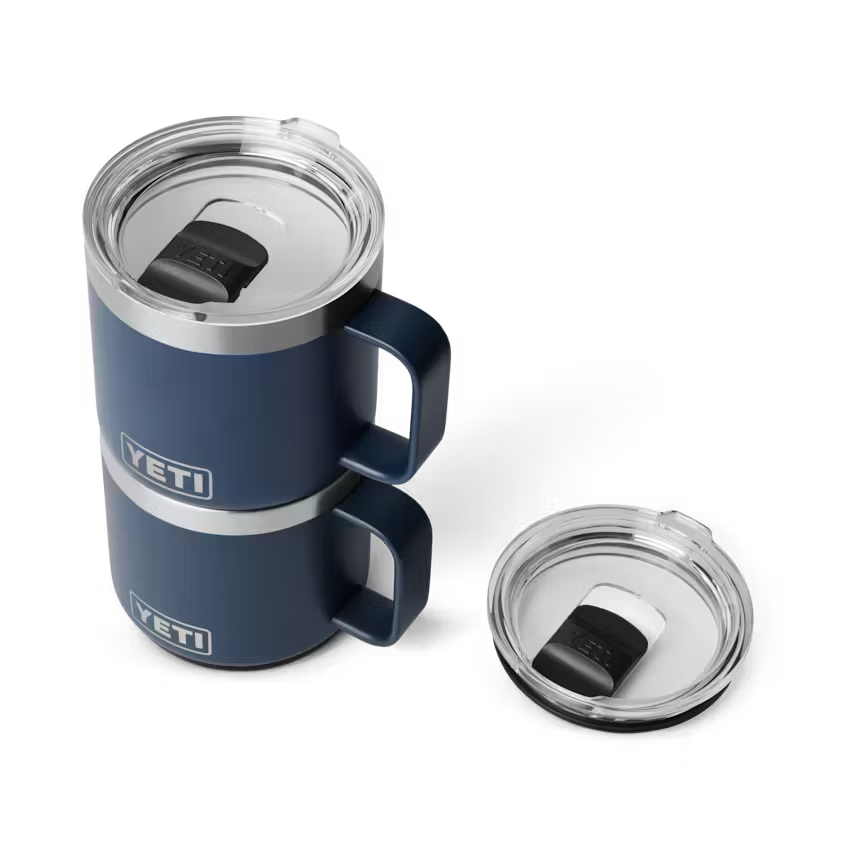 Blue YETI mug with clear lid on a white background