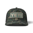 YETI Truckerspet in camouflagekleuren met logo Green Camo